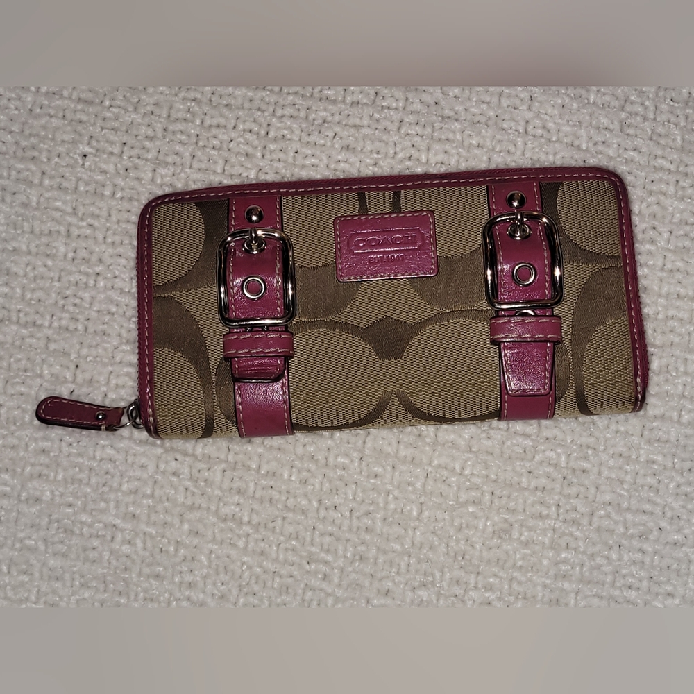 Purple pinkish wallet coach